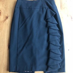 Ruffled pencil skirt with leopard lining.